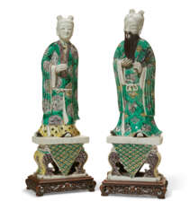 A PAIR OF CHINESE EXPORT PORCELAIN BISCUIT-GLAZED FIGURES OF IMMORTALS