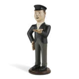 A CARVED AND PAINTED TRAIN CONDUCTOR FIGURE - photo 2