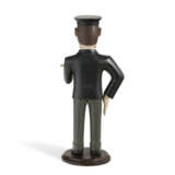 A CARVED AND PAINTED TRAIN CONDUCTOR FIGURE - photo 3