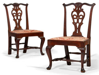 A PAIR OF CHIPPENDALE CARVED MAHOGANY SIDE CHAIRS