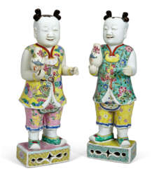 A LARGE PAIR OF CHINESE EXPORT PORCELAIN FAMILLE ROSE LAUGHING BOYS