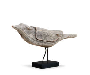 A CARVED BIRD