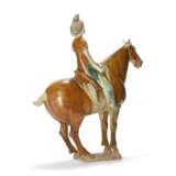A GROUP OF THREE TANG-STYLE SANCAI-GLAZED POTTERY EQUESTRIAN FIGURES - photo 2