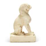A CARVED MARBLE FIGURE OF A SEATED LION - photo 4