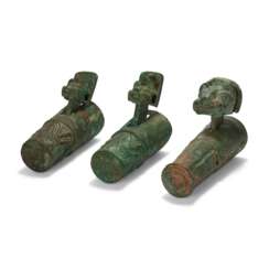 A GROUP OF THREE BRONZE CHARIOT FITTINGS