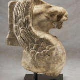 A ROMAN MARBLE INSCRIBED TRAPEZOPHOROS IN THE FORM OF A GRIFFIN - фото 2