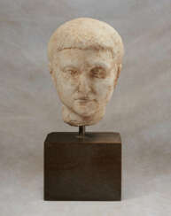 A ROMAN MARBLE PORTRAIT HEAD OF A BOY