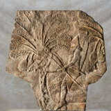 AN ASSYRIAN GYPSUM RELIEF FRAGMENT - фото 1