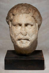 A ROMAN MARBLE PORTRAIT HEAD OF THE EMPEROR HADRIAN