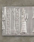 Ancient Near Eastern. AN OLD BABYLONIAN HEMATITE CYLINDER SEAL