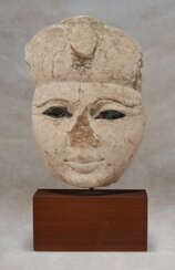 AN EGYPTIAN LIMESTONE AND &#39;EGYPTIAN BLUE&#39; HEAD OF A QUEEN OR GODDESS