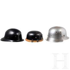 Sechs Helme, meist Feuerwehr, 1930er - 1980er Jahre
