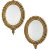 A PAIR OF ENGLISH GILTWOOD AND COMPOSITION OVAL MIRRORS - photo 1