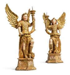 A PAIR OF ITALIAN POLYCHROME-PAINTED GILTWOOD FIGURAL PRICKIT CANDLESTICKS