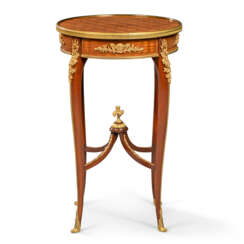A LOUIS XV-STYLE ORMOLU-MOUNTED MAHOGANY AND KINGWOOD PARQUETRY GUERIDON