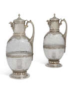Elkington & Co.. A PAIR OF LATE VICTORIAN SILVER-PLATE MOUNTED ETCHED GLASS CLARET JUGS