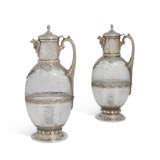 A PAIR OF LATE VICTORIAN SILVER-PLATE MOUNTED ETCHED GLASS CLARET JUGS - фото 1