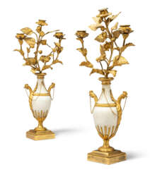 A PAIR OF LATE LOUIS XVI ORMOLU AND WHITE MARBLE THREE-BRANCH CANDELABRA