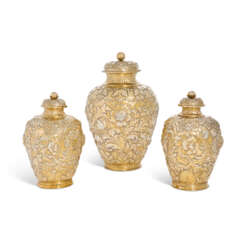 A SET OF THREE CHARLES II SILVER-GILT FURNISHING VASES AND COVERS