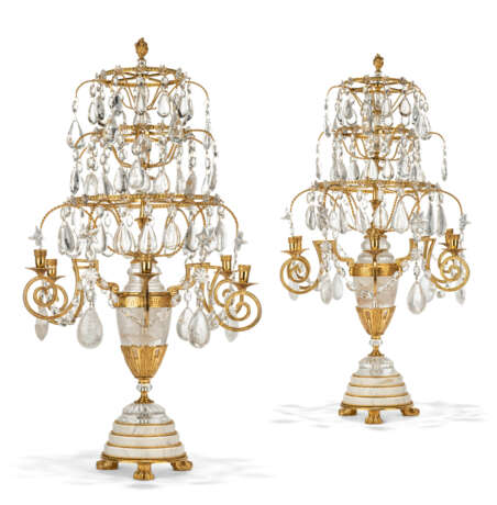 A PAIR OF ORMOLU-MOUNTED ROCK CRYSTAL AND CUT-CRYSTAL FIVE-LIGHT CANDELABRA - photo 1