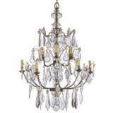 A FRENCH CUT-GLASS AND BRASS TWELVE-LIGHT CHANDELIER - фото 1