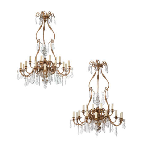 A PAIR OF LOUIS XVI-STYLE GILT-BRONZE AND CUT-GLASS EIGHTEEN-LIGHT CHANDELIERS - фото 1