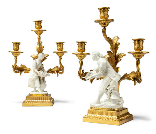 A PAIR OF FRENCH ORMOLU-MOUNTED BISCUIT PORCELAIN THREE-LIGHT CANDELABRA - фото 1