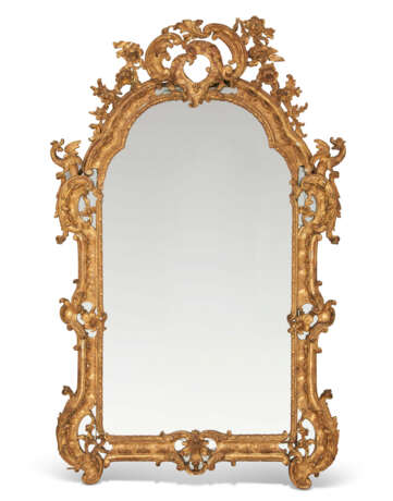 A NORTH EUROPEAN CARVED GILTWOOD MIRROR - photo 1