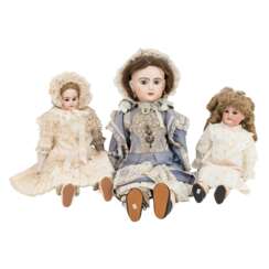 3-piece set of porcelain head dolls late 19th/early 20th c.