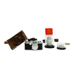 CAMERA LEICA IIIf WITH THREE LENSES AND ACCESSORIES,