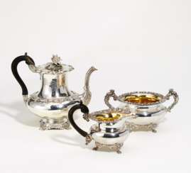 Silver coffee pot with flower knob and milk jug and sugar bowl with snail décor