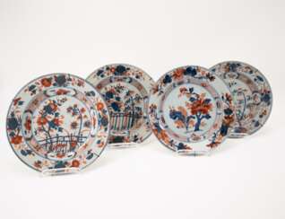 Four plates with flower decor