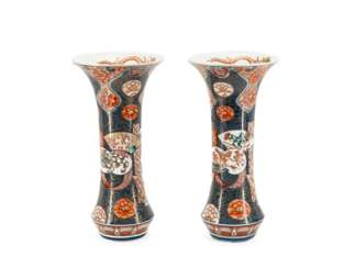 Pair of trumpet shaped vases with Imari décor