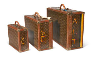 A SET OF THREE PERSONALIZED BROWN MONOGRAM LACQUERED CANVAS HARDSIDED SUITCASES