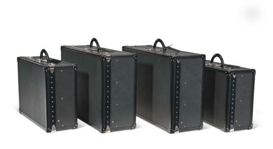 A SET OF FOUR BLACK TAIGA LEATHER HARDSIDED ALZER 60, 65 & 80 SUITCASES - Foto 1