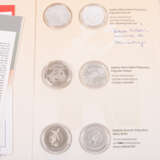 Aluminum case with modern world and course coins, - photo 5