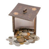 Old wooden box with various coins, including one strong - photo 1