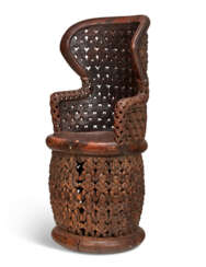 A CARVED WOOD THRONE CHAIR