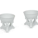 A PAIR OF FRENCH (LIMOGES) PORCELAIN BREAST-FORM CUPS ON STANDS - фото 1