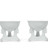 A PAIR OF FRENCH (LIMOGES) PORCELAIN BREAST-FORM CUPS ON STANDS - фото 2