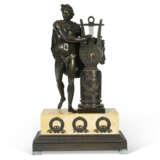 A FRENCH PATINATED BRONZE AND YELLOW MARBLE FIGURAL CLOCK - photo 1