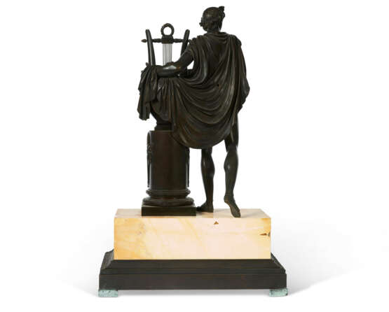 A FRENCH PATINATED BRONZE AND YELLOW MARBLE FIGURAL CLOCK - photo 3