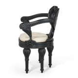 A SET OF FOUR EBONIZED FIVE-LEGGED "ZEUS" ARMCHAIRS - photo 3