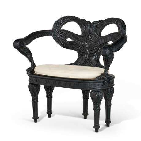 A SET OF FOUR EBONIZED FIVE-LEGGED "ZEUS" ARMCHAIRS - photo 4