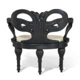 A SET OF FOUR EBONIZED FIVE-LEGGED "ZEUS" ARMCHAIRS - photo 5