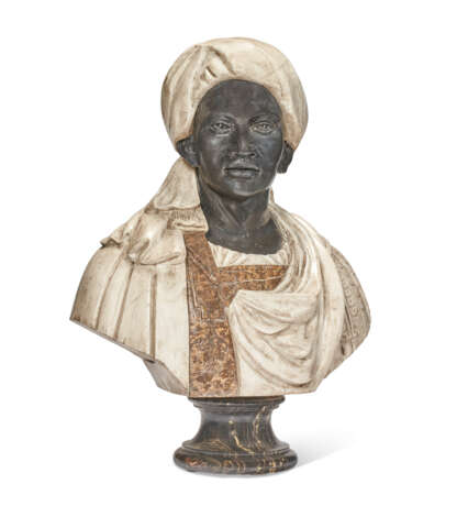 A CARVED MARBLE BUST OF A MOOR - фото 1