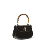 A BLACK PATENT LEATHER BAMBOO TOP HANDLE BAG WITH GOLD HARDWARE - photo 2