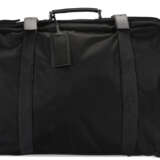 A BLACK NYLON ROLLING SUITCASE WITH SILVER HARDWARE - фото 1