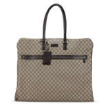 A BROWN MONOGRAM COATED CANVAS GARMENT BAG WITH SILVER HARDWARE - Foto 1