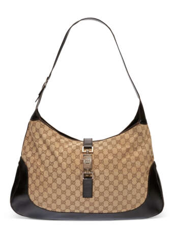 A BROWN MONOGRAM CANVAS & BLACK LEATHER OVERSIZED JACKIE BAG WITH SILVER HARDWARE - Foto 1